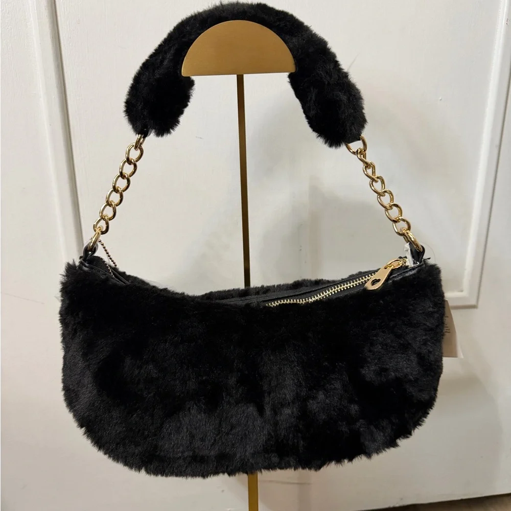 Juicy Couture black fuzzy bag. Comes with the heart and crown charm. - Picture 2 of 6